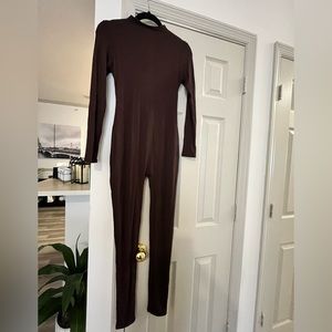 Chocolate Long Sleeve Jumpsuit. Size M. No tag but never worn.